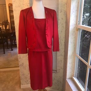 Red 3 piece suit, strappy blouse and jacket
